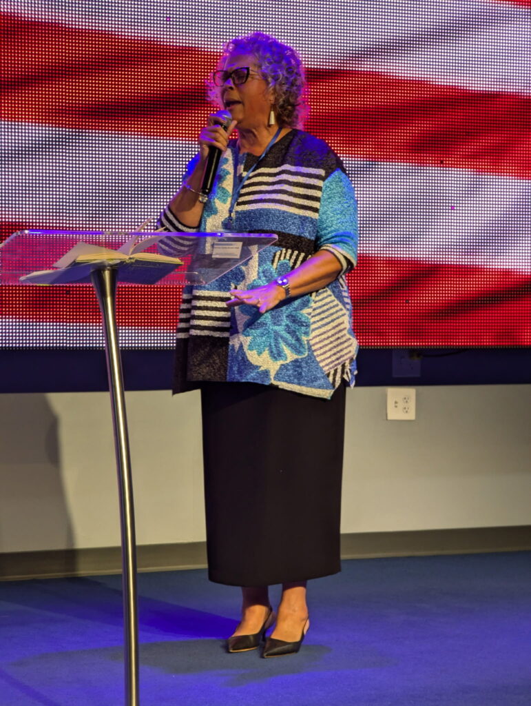 On stage with american flag 2